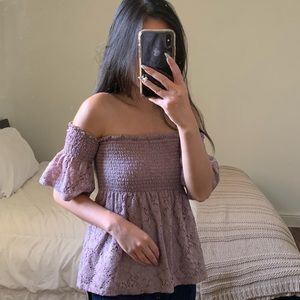Mischievous purple off shoulder ruffle hem top